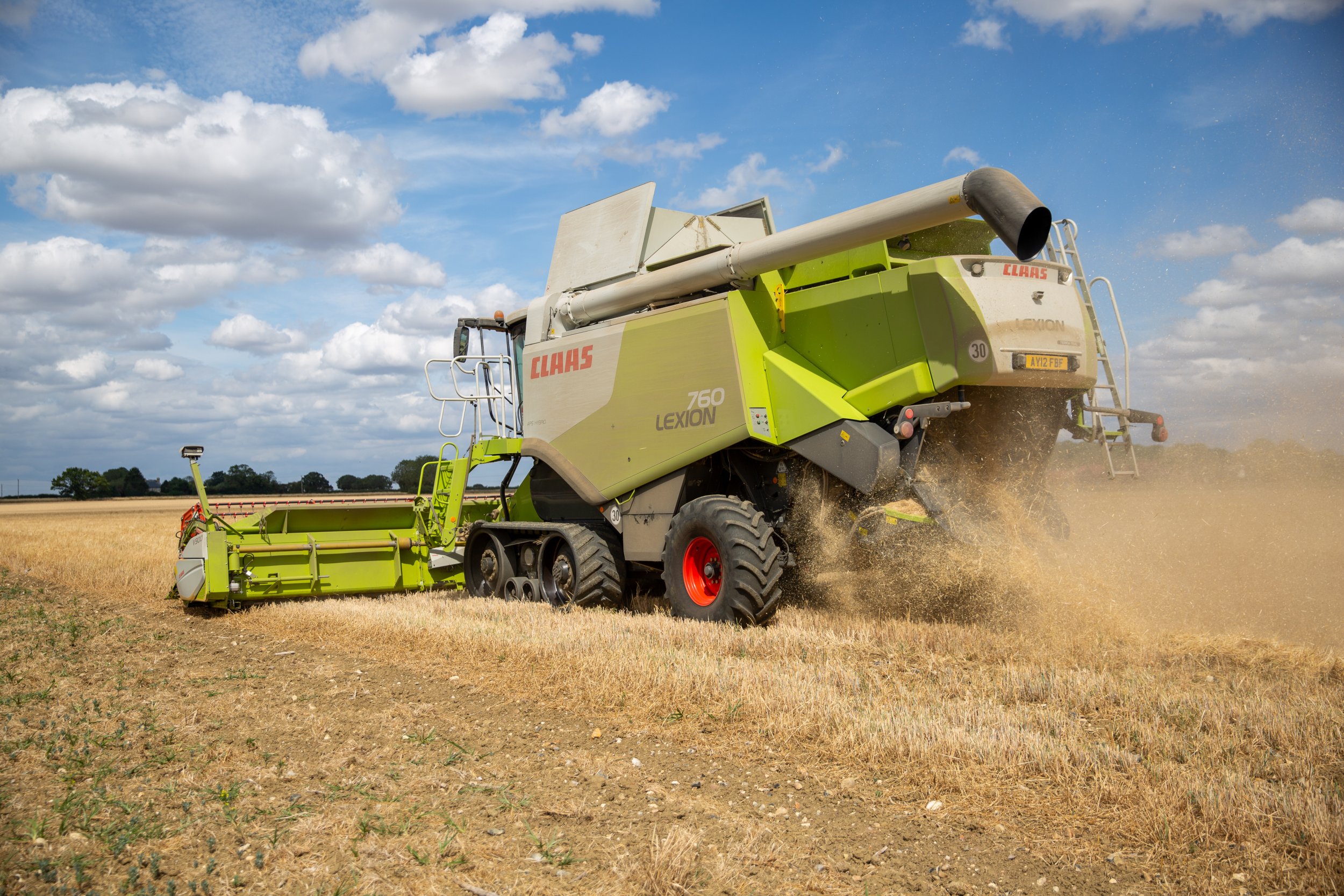 CLAAS combine harvester, harvesting a dry field